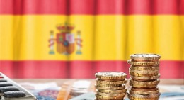 Columnas de monedas. Fuente: EFE.