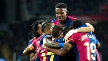 Foto jugadores celebrando. 